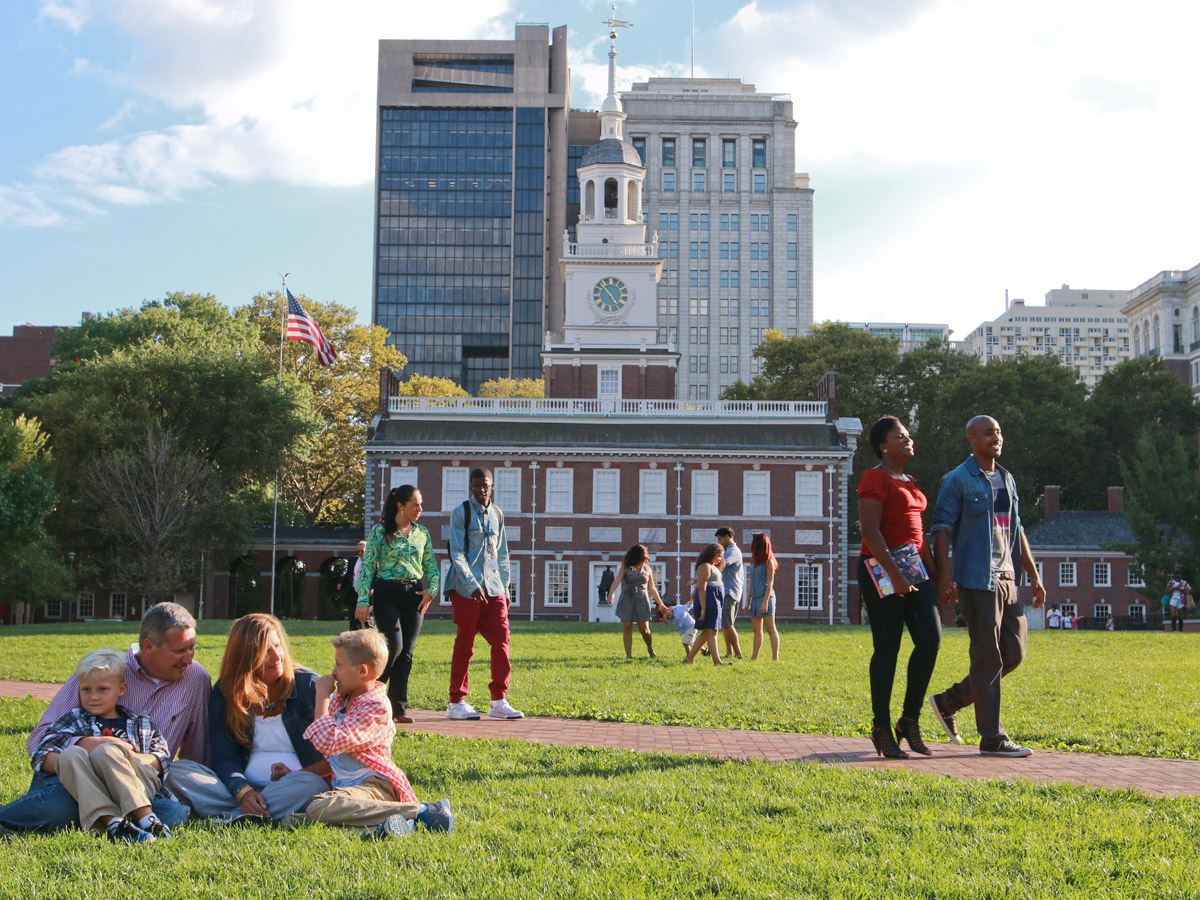 People lounging on Independence Mall in front of Independence Hall