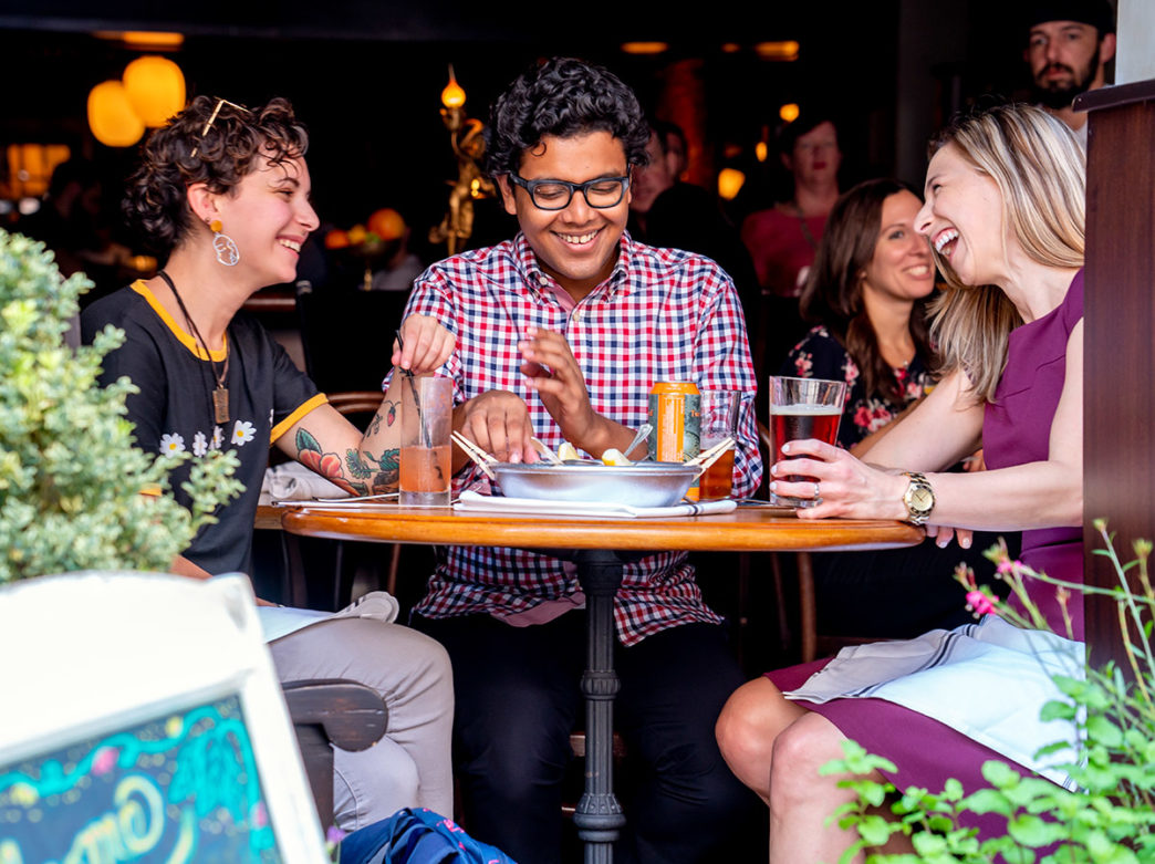 Friends eating at Royal Boucherie in Philadelphia