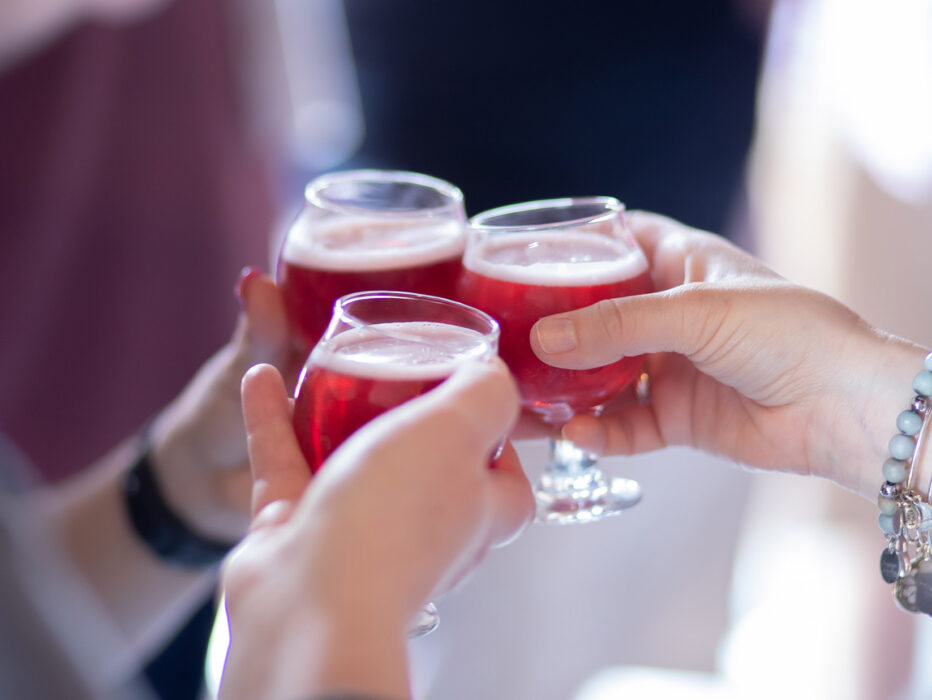Three people cheers a sample of beer on City Brew Tours Philadelphia