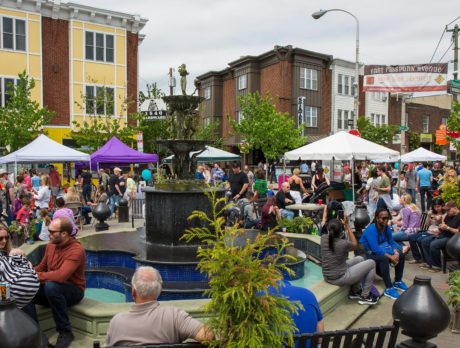 A crowd around the Singing Fountain during Flavors on the Avenue