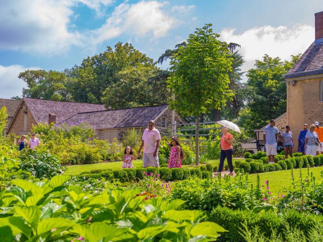 People walking through Bartram's Garden