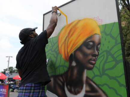 A painter at Juneteenth Celebration during Wawa Welcome America festival.