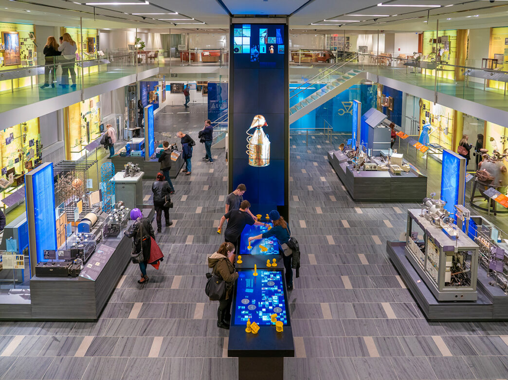 People examine and interact with the various displays at the Science History Institute in Philadelpha.
