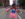 Dancers wear red, white and blue costumes and hats while they perform in the street during the Fourth of July Parade in Philadelphia.
