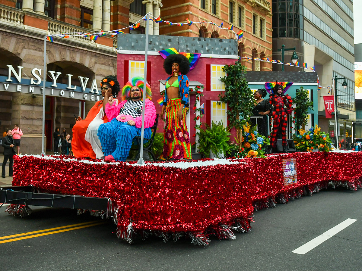 A colorful float featuring a few of Philadelphia's favorite drag queens makes its way down Market Street.